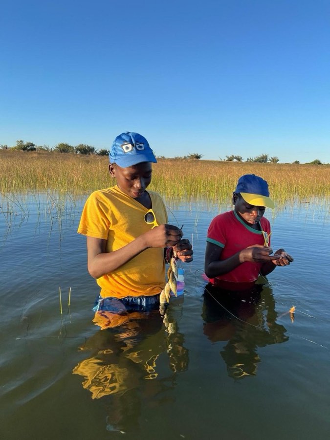 Children fishing at the lakes near Vilanculos