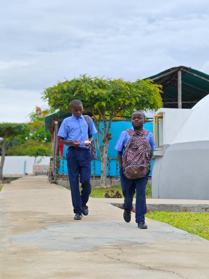 A Goodwill team member outside the home in Vilanculos